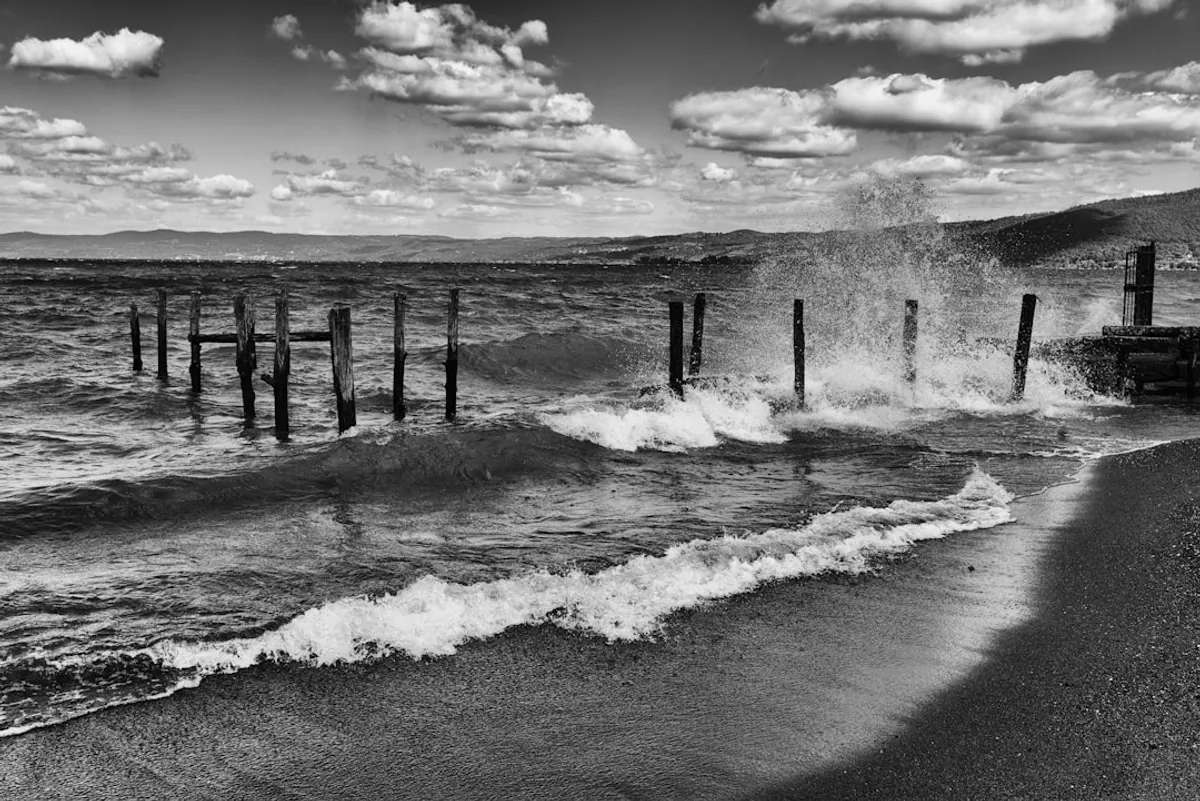 Rock bags armoring a Gulf Coast beach against storm surge, blue water